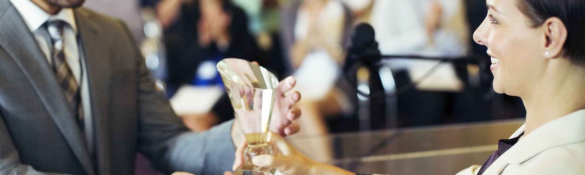 Women receiving an award